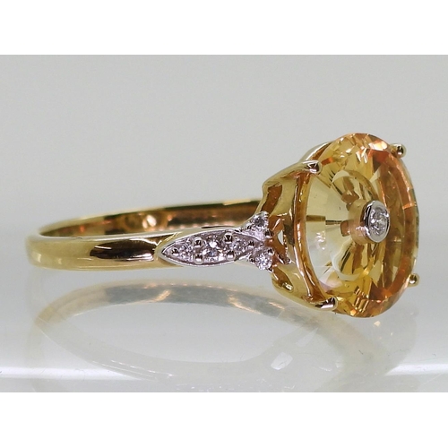 710 - A 9ct gold Glen Lehrer citrine and diamond 'Torus' ring, size S1/2, weight 2.8gms