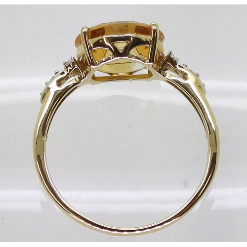 710 - A 9ct gold Glen Lehrer citrine and diamond 'Torus' ring, size S1/2, weight 2.8gms