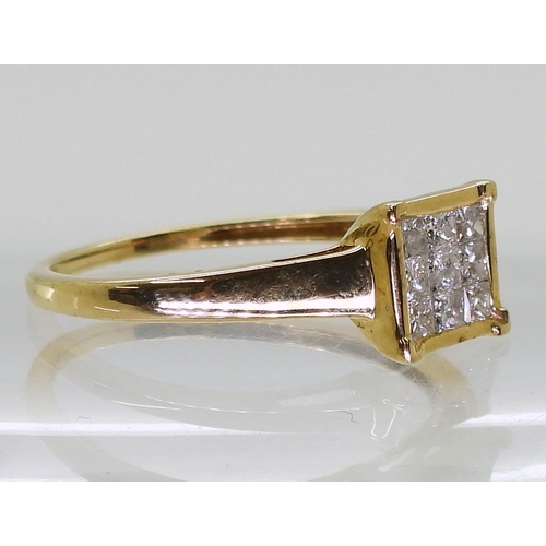 711 - A 9ct gold princess cut diamond cluster ring, set with nine diamonds with an estimated approximate t... 