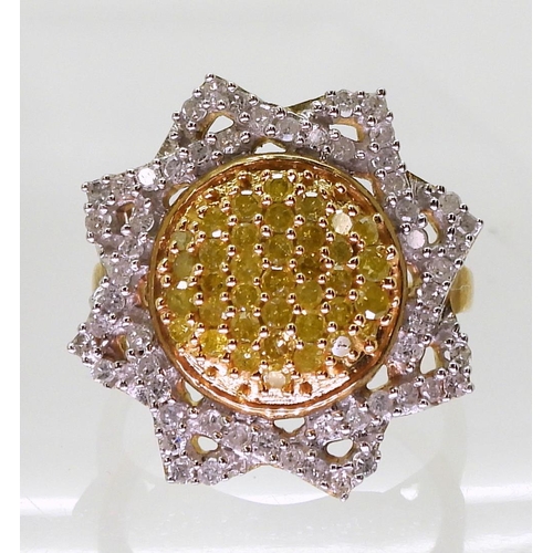 722 - A 9ct gold yellow and white diamond sunflower ring, size J1/2, weight 3gms