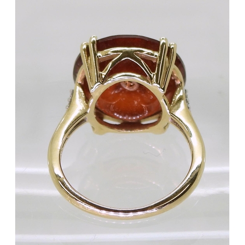 729 - A 9ct gold Glen Lehrer carnelian and diamond 'Torus' ring, size J1/2, weight 4.3gms 