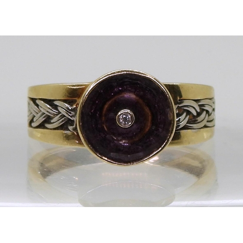 733 - A 9ct gold Glen Lehrer amethyst and diamond ring, with white gold braided shoulder detail. Size S1/2... 