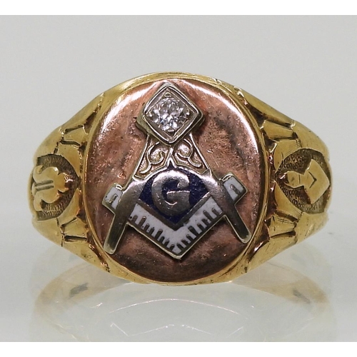 736 - A 10k gold Masonic signet ring, set with a diamond and enamel, size U1/2, weight 6.1gms