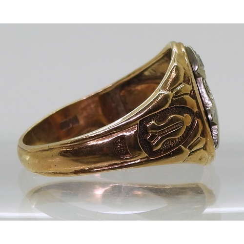 736 - A 10k gold Masonic signet ring, set with a diamond and enamel, size U1/2, weight 6.1gms