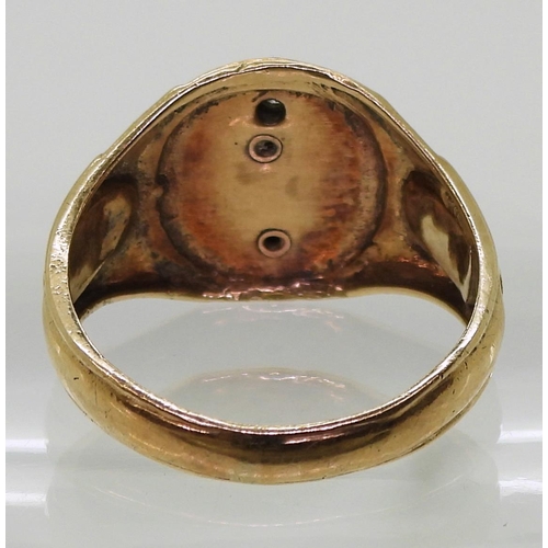 736 - A 10k gold Masonic signet ring, set with a diamond and enamel, size U1/2, weight 6.1gms