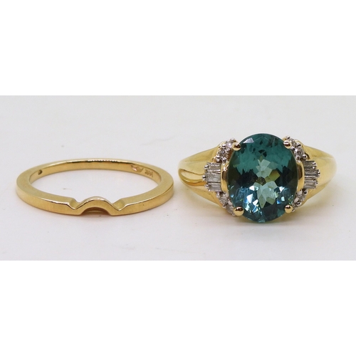 739 - A 14k gold teal colour tourmaline and diamond ring, size O1/2, together with a shaped to fit band ri... 