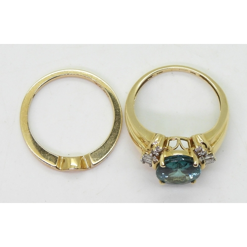 739 - A 14k gold teal colour tourmaline and diamond ring, size O1/2, together with a shaped to fit band ri... 