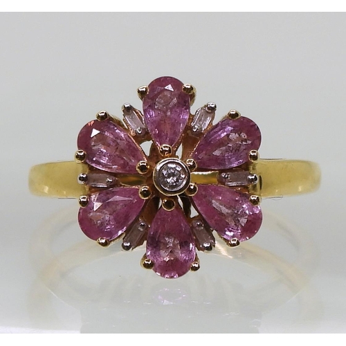 742 - An 18ct gold pink sapphire and diamond ring, size L1/2, weight 3.4gms