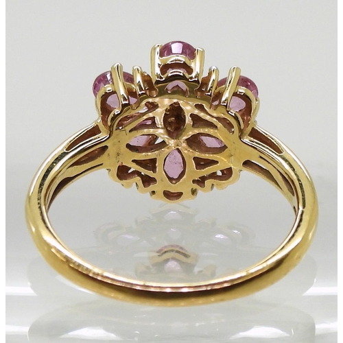 742 - An 18ct gold pink sapphire and diamond ring, size L1/2, weight 3.4gms