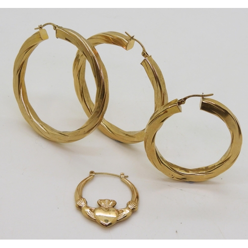 749 - A large pair of hoop earrings 5cm diameter and two odd earrings, weight together 10.3gms