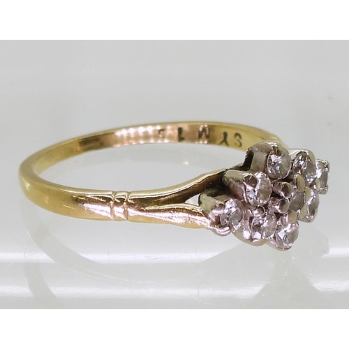 758 - An 18ct gold boat shaped diamond cluster ring, set with estimated approx 0.50cts of brilliant cut di... 