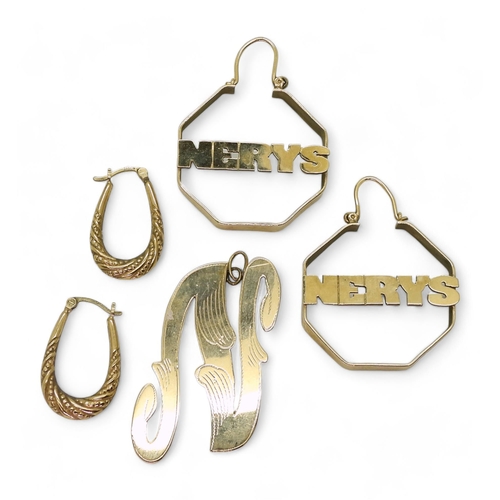 763 - A large pair of yellow metal 'Nerys' earrings, a further pair of creole earrings, and an 'N' pendant... 