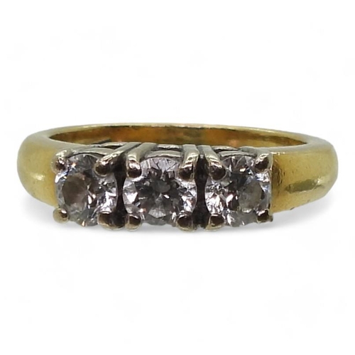 773 - An 18ct gold three stone diamond ring, set with estimated approx 0.75cts, finger size K1/2, weight 5... 