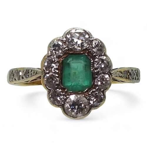 774 - An 18ct gold diamond and emerald ring, set with estimated approx 0.48cts of brilliant cut diamonds, ... 