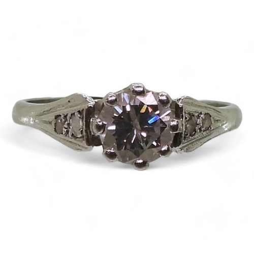 775 - A platinum diamond solitaire, of estimated approx 0.75cts, with further rose cuts to the shoulders, ... 