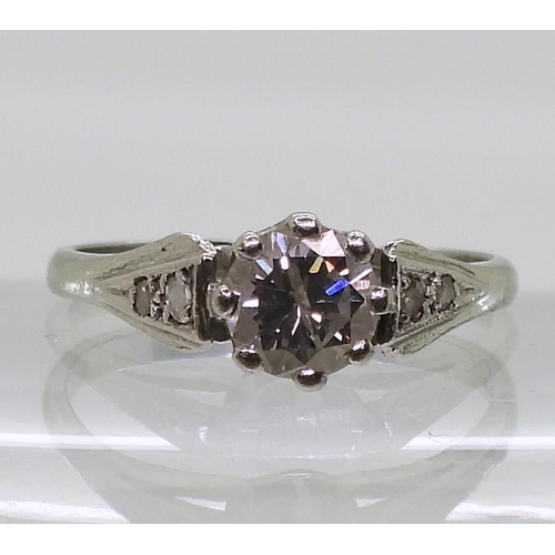 775 - A platinum diamond solitaire, of estimated approx 0.75cts, with further rose cuts to the shoulders, ... 