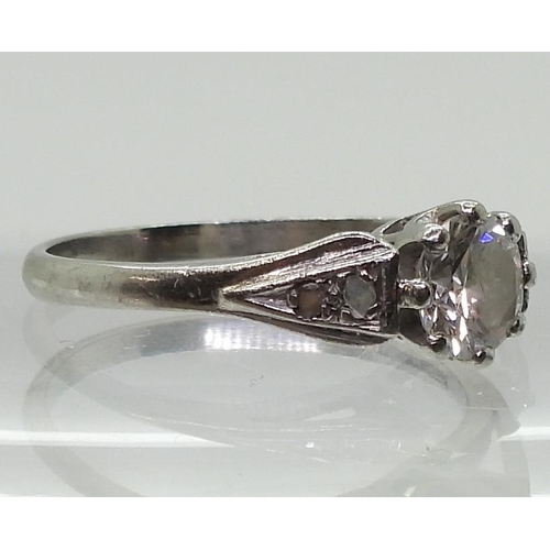 775 - A platinum diamond solitaire, of estimated approx 0.75cts, with further rose cuts to the shoulders, ... 