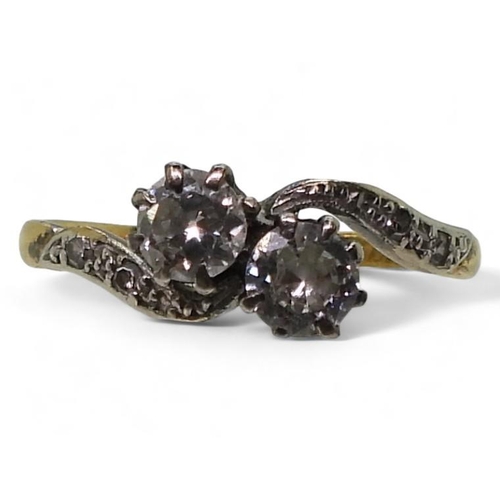 776 - An 18ct gold vintage twin stone diamond ring, set with estimated approx 0.30cts combined, finger siz... 