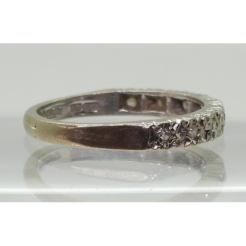 777 - An 18ct white gold illusion set eternity ring, size O1/2, weight 3.4gms