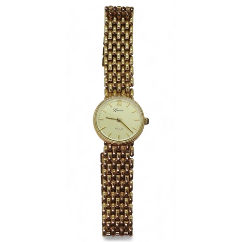 778 - A 9ct gold ladies Geneve watch, weight including mechanism 15.8gms