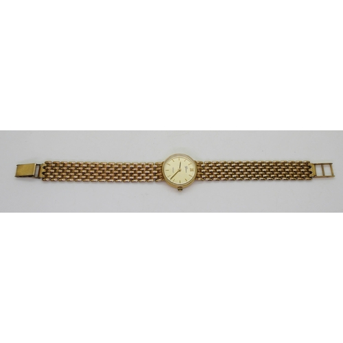 778 - A 9ct gold ladies Geneve watch, weight including mechanism 15.8gms