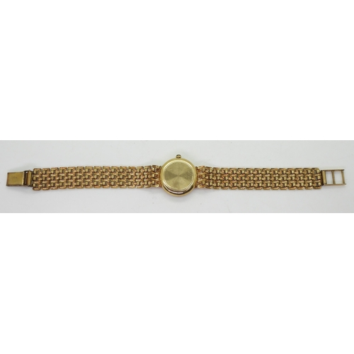 778 - A 9ct gold ladies Geneve watch, weight including mechanism 15.8gms