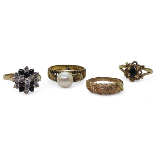 785 - A ring set with a pearl, stamped 14k  finger size N, together  with three 9ct rings, weigh... 