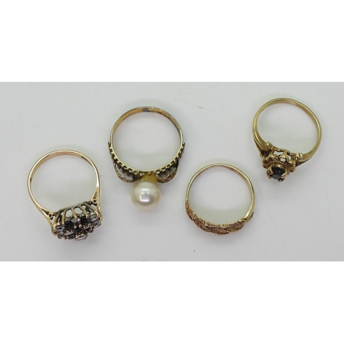 785 - A ring set with a pearl, stamped 14k  finger size N, together  with three 9ct rings, weigh... 