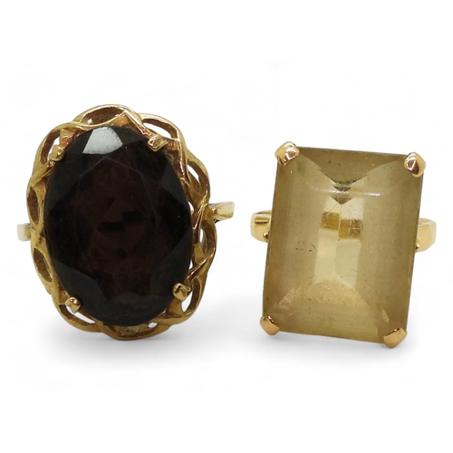 786 - Two quartz rings, a smoky quartz in 9ct mount finger size U, together with a citrine in bright yello... 