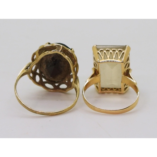 786 - Two quartz rings, a smoky quartz in 9ct mount finger size U, together with a citrine in bright yello... 