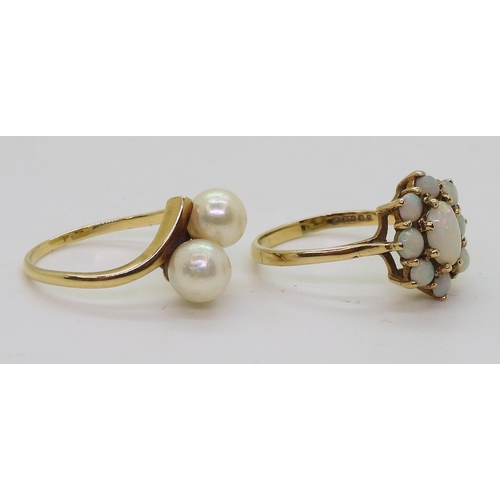 788 - A 14k gold Mikimoto twin pearl ring, inner shank stamped with the logo, finger size O1/2, weight 2.9... 