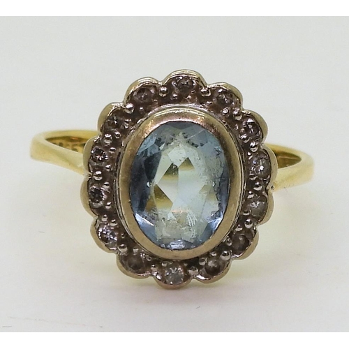 789 - An 18ct aquamarine and diamond cluster ring, size P, weight 4.2gms