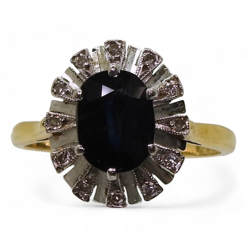 795 - An 18ct gold sapphire and diamond accent cluster ring, size R, weight 4.9gms