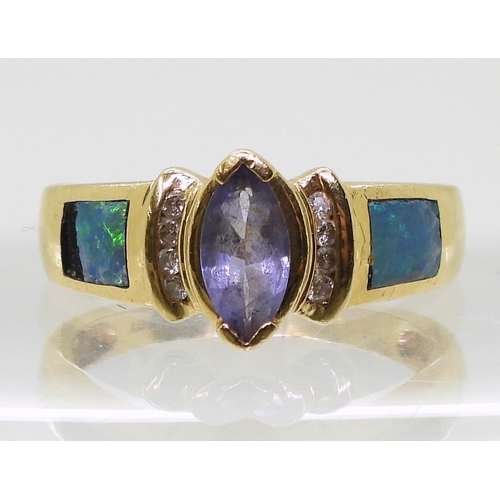 796 - A 14k gold tanzanite, opal and diamond ring, size L1/2, weight 4.5gms