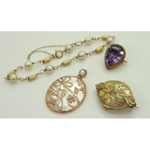 810 - A 9ct rose gold and mother of pearl pendant, an amethyst brooch mounted in yellow metal, and a yello... 