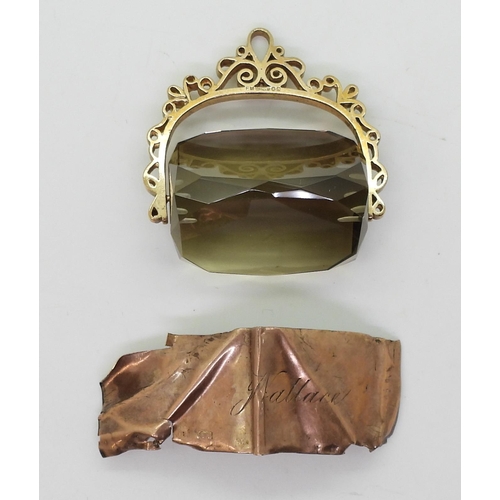 816 - A very large smoky quartz fob seal, quartz 28mm x 23mm, and a piece of scrap 9ct sheet (hallmarked) ... 