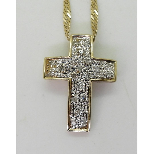 818 - A 9ct gold diamond set cross, length 2cm, and a 50cm rope chain, weight 3gms