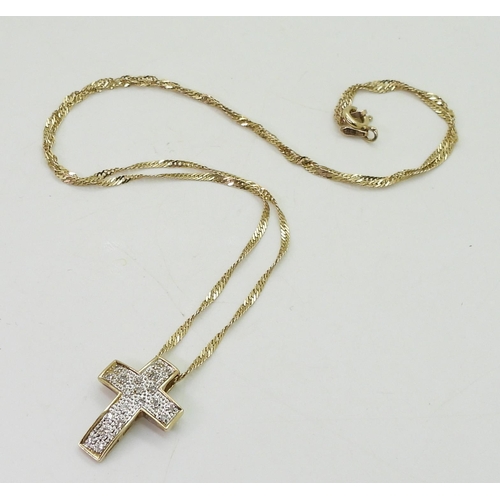 818 - A 9ct gold diamond set cross, length 2cm, and a 50cm rope chain, weight 3gms