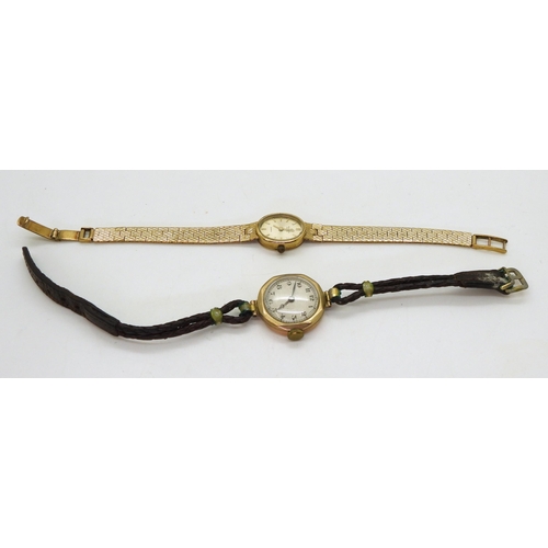 835 - A 9ct gold ladies Marvin revue watch with integral strap and a ladies vintage 9ct gold watch head, w... 