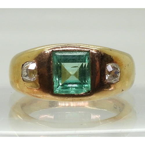 854 - An 18ct gold emerald and diamond ring, set with two old cushion cut diamonds of estimated approx 0.4... 