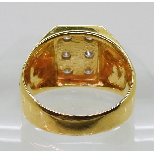 860 - A yellow metal gents signet ring stamped 750, set with six diamonds, with an estimated approx diamon... 