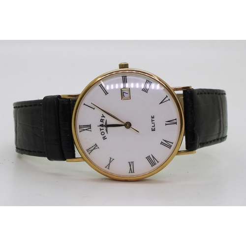 874 - A 9ct gold Rotary Elite watch, with black leather strap, weight 24.6gms