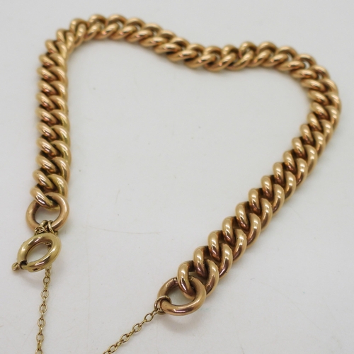 876 - A 9ct rose gold curb chain bracelet, hallmarked to every link, length 20cm, weight 25.5gms