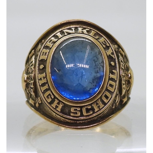 884 - A 10k gold Balfour brand American college ring, set with a blue gem, for Brinkley High School 1964, ... 