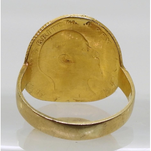 885 - A 1910 gold half sovereign with a soldered on 9ct shank, size P, weight 5.1gms,