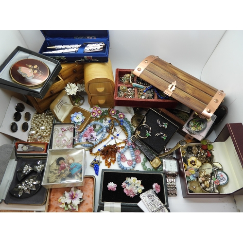 898 - A large quantity of vintage costume jewellery to include, good bead necklaces, two miniature chests ... 