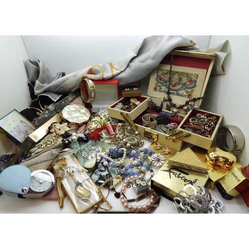 900 - A large collection of vintage costume jewellery and compacts to include a triangular Faberge compact... 