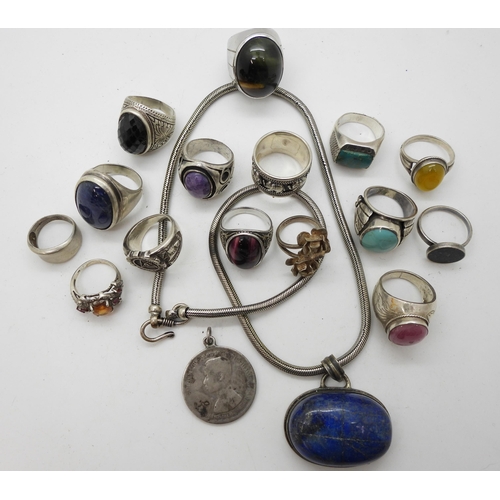 918 - A collection of silver and white metal jewellery with a large lapis lazuli pendant, a Thai coin with... 