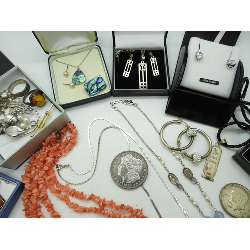 922 - Silver Macintosh jewellery, amber earrings and pendant, paua shell items, a 1898 silver dollar coin ... 