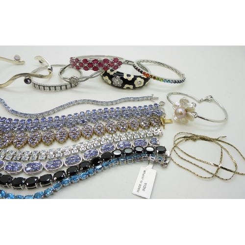 923 - A collection of silver GemsTV jewellery to include gem set bracelets to include tanzanite, blue topa... 